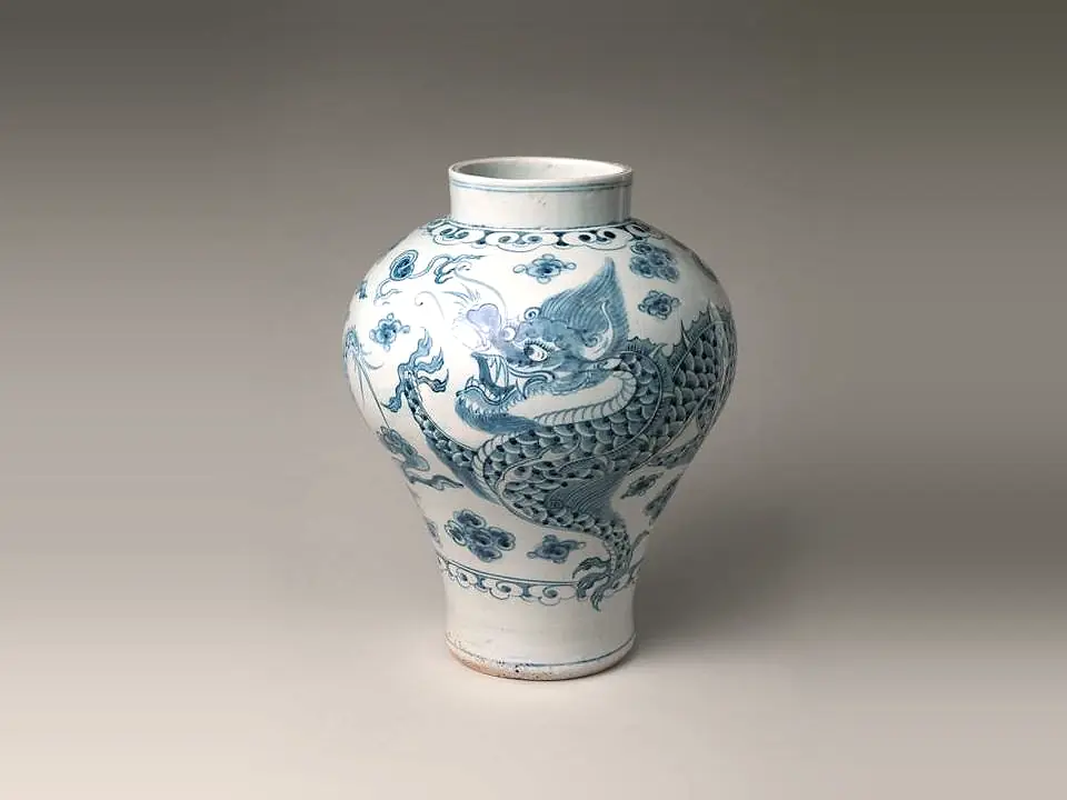 A porcelain jar painted in cobalt blue with a coiling dragon. November 2024 drop, sold out.